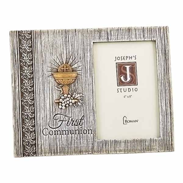 Distressed First Communion Frame has a Chalice, Host & Grapes design with the words First Communion.  This First Communion Frame is 7.5 inches high and holds a 4" x 6" vertical photo 602060