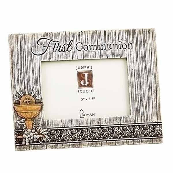 Distressed First Communion Frame has a Chalice, Host & Grapes design with the words First Communion.  This First Communion Frame is 6.5 inches high and holds a 3.5" x 5" horizontal photo 602061
