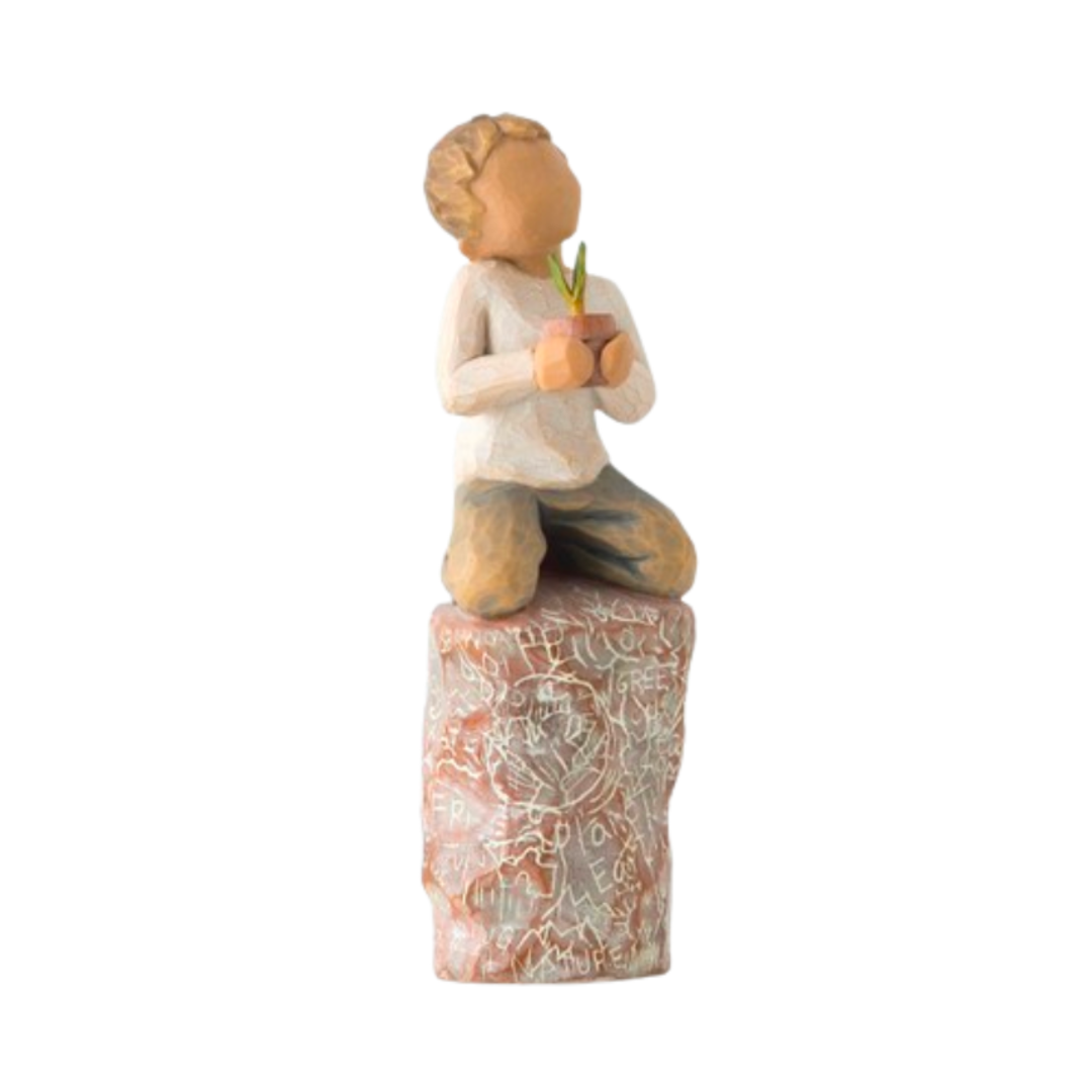 Willow Tree Figurine, Something Special: You make the world a better place, 5.5" High 27269. This is a figurine of a small boy kneeling on a rock or stump with a flower pot in his hands 27269 FREE SHIPPING WITH $100. ORDERS